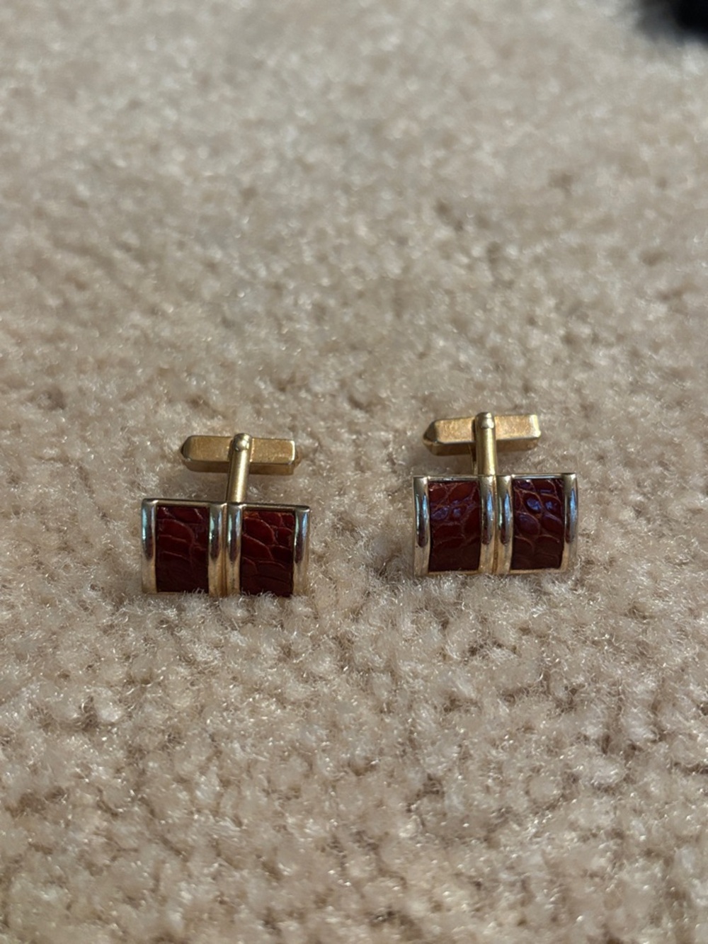Swank  Men’s gold and leather cufflinks